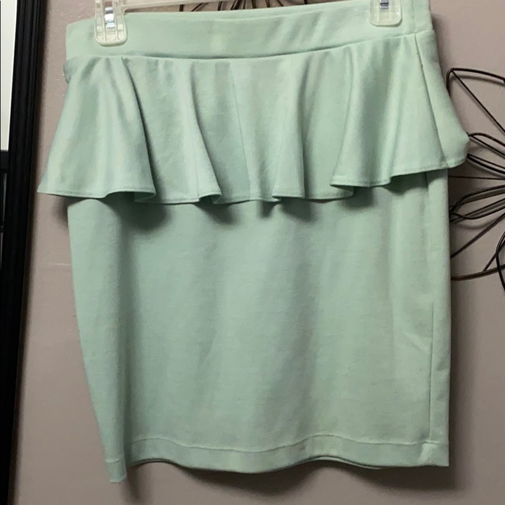 Mint green peplum mini skirt